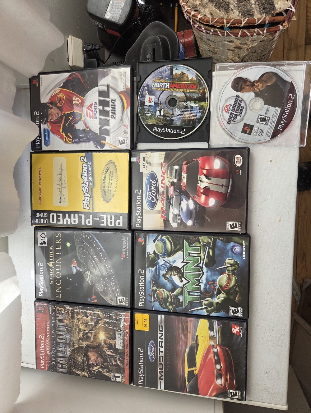 Sony PlayStation 2 Game Bundle with Black, White, Red Covers